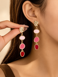 Pendientes Éclat Nude — modelo rosa.